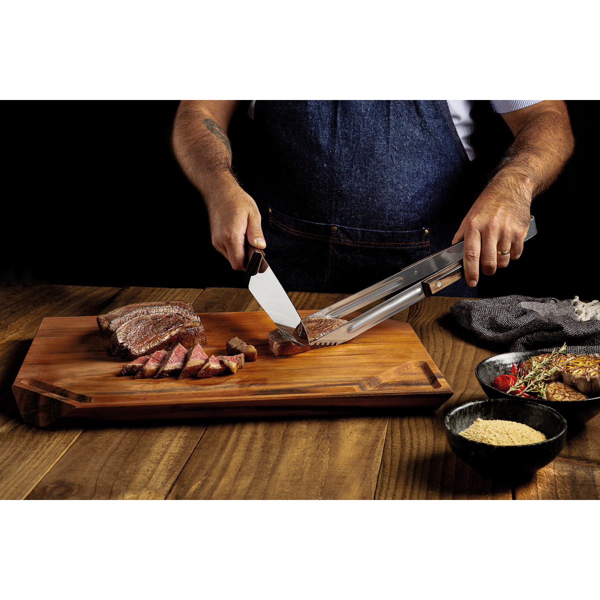 Kit para Churrasco Tramontina com L&acirc;mina em A&ccedil;o Inox Cabo de Madeira Polywood Castanho com T&aacute;bua de Madeira 3 Pe&ccedil;as Cor Polywood castanho - SKU 21197901 - 4 image number 3